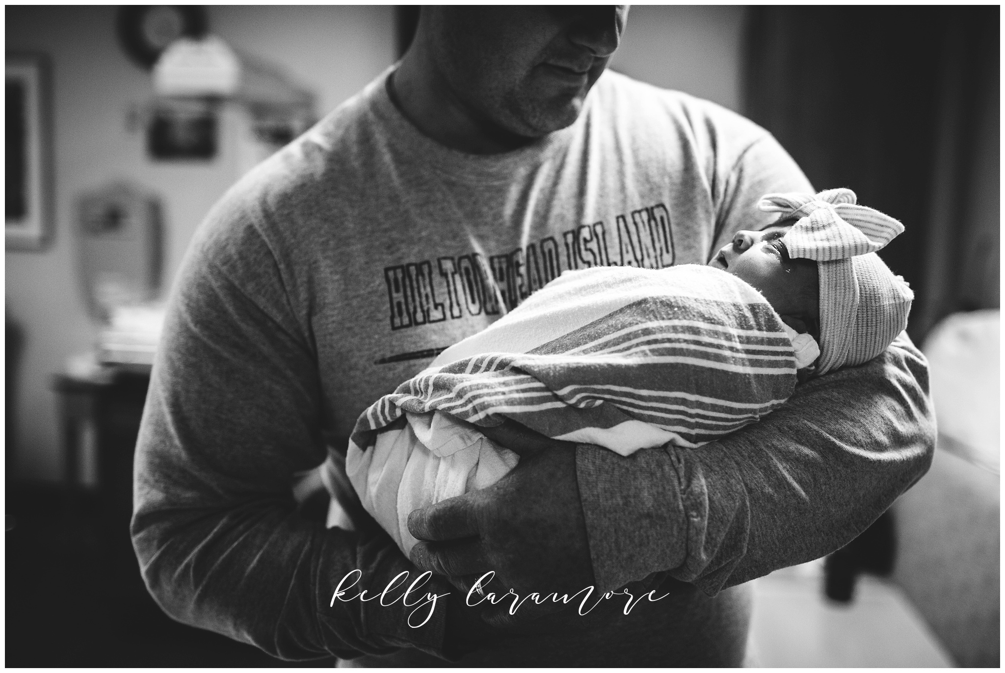 st louis birth story photographer, st louis family photographer, missouri baptist birth center birth, delivery room, baby in dads arms