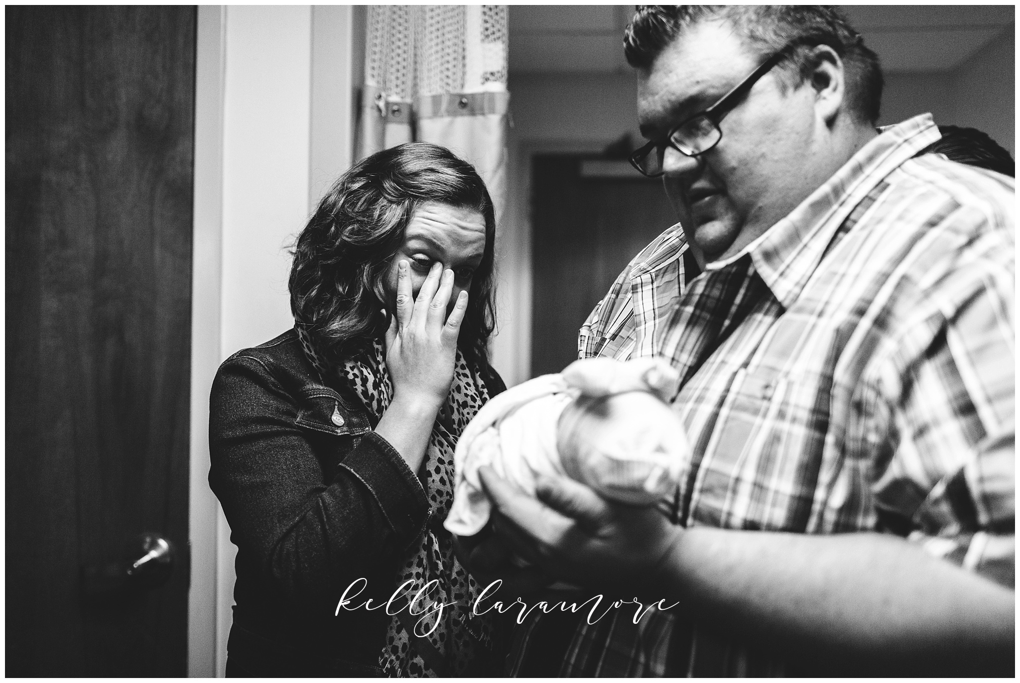 st louis birth story photographer, st louis family photographer, missouri baptist birth center birth, delivery room, crying relatives