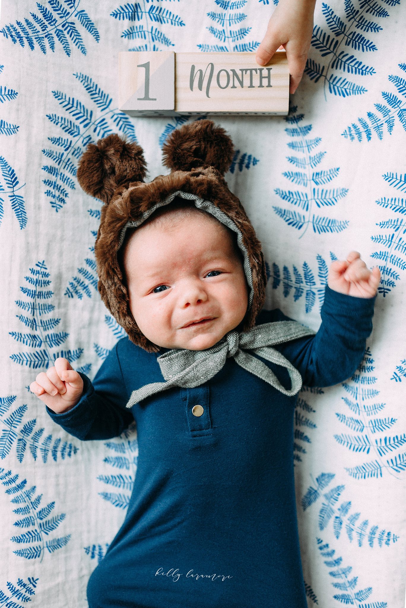 newborn, monthly baby photos, one month old, baby bear hat, blue onesie