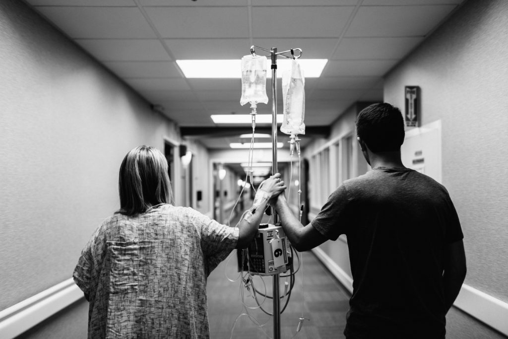 Laboring mom and dad walking the hallways to speed up labor at St. Luke's Medical Center in St. Louis, Missouri. 