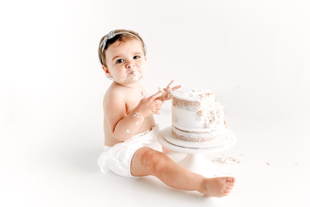 All white cake smash baby milestone session in St Louis.  