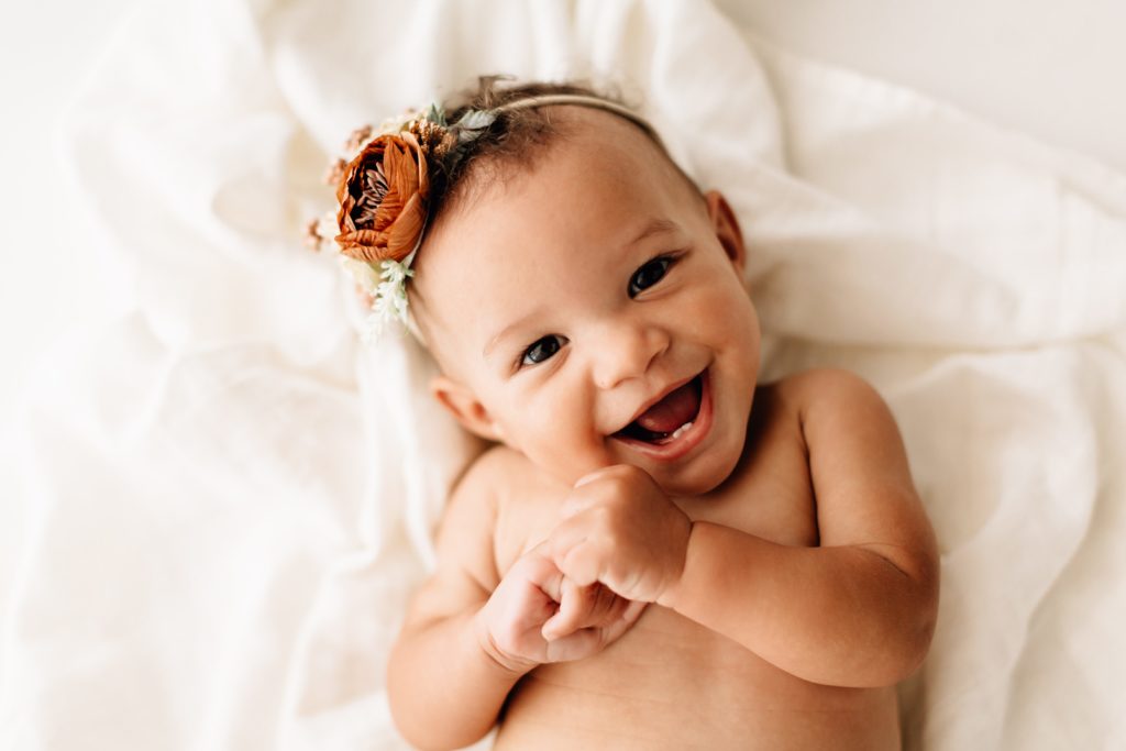 Smiling baby with headband