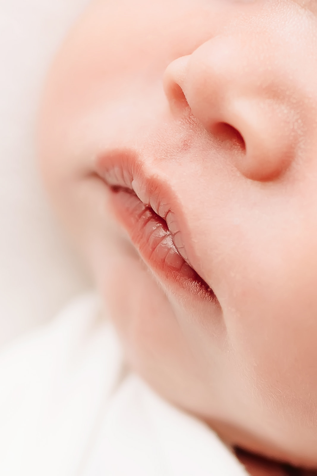 details of a newborn baby face Purple Lotus Doulas