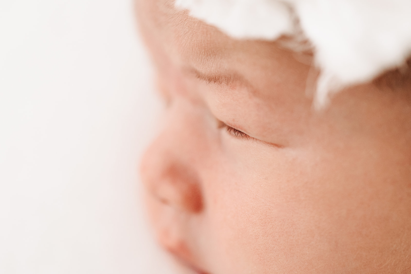 Details of a sleeping newborn baby's face